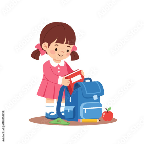 A young girl with pigtails is packing a red book into her blue backpack, with school supplies nearby.