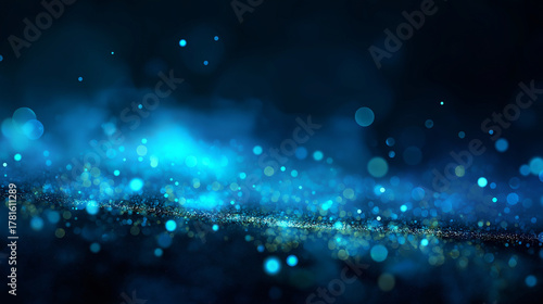 dark blue background with glowing particles and bokeh lights. 
