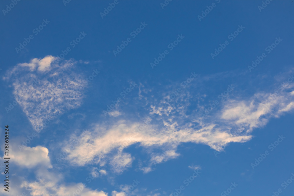 Fototapeta premium Heart-Shaped Cloud in the Blue Sky
