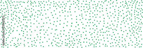 Abstract pattern of scattered green dots on a white background forming a dynamic, random texture. Modern minimalistic background for design, technology, or digital art concepts.