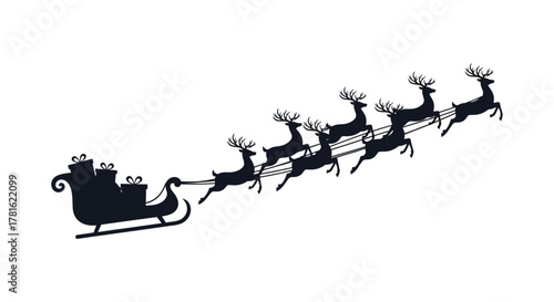 Santa claus in his sleigh pulled by reindeer flying through the night sky silhouette