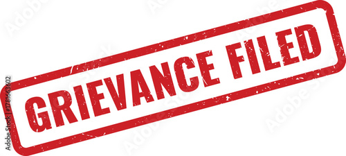 Red grunge rubber stamp mark with the text Grievance Filed displayed on a white surface