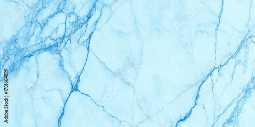 Abstract artwork features flowing blue marble textures blended with ink effects creating a dreamy, ethereal atmosphere. Ideal for backgrounds.