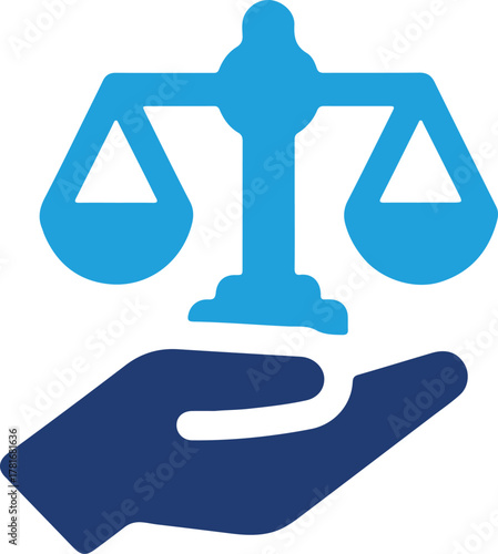 Hand holding scales of justice for legal concept