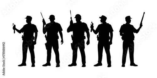 Silhouette of police officers standing