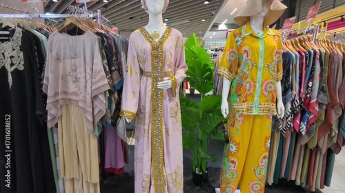 Sepang, Malaysia - November 2, 2025: Malaysian Batik clothing, from daily wear to premium apparel, is displayed for sale at KLIA2. These unique, handcrafted batik patterns showcase local artistry.