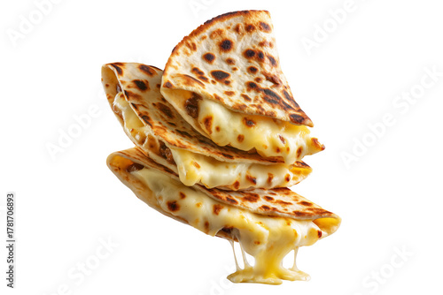 Grilled cheese quesadilla or Cachapas sweet corn pancakes with melted white cheese stacked, isolated on white transparent background, concept of Venezuela street fast food