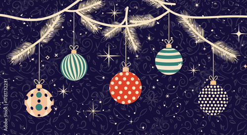 Festive holiday ornaments hang from a decorated pine branch against a dark starry background.