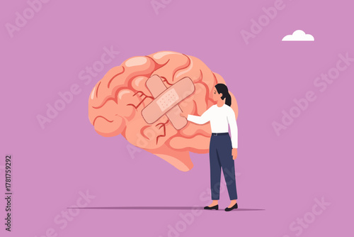 businessman treats Human Brain With Adhesive Plaster, businessman placing bandage on injury, healing or relaxation of the mind