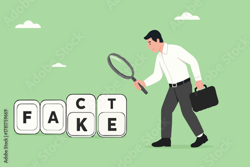 analyze fake or fact, fact or fake concept, Misinformation spread by the tricks of brains, businessman analyzes the cube with the words fact and fake using a magnifying glass