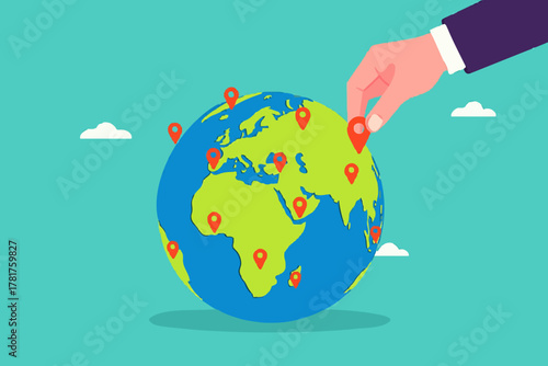 Businessman hand put new branch pin on world map across globe.Global business expansion, open company branches, franchise in new location to cover all continent. growing business worldwide concept