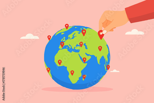 Businessman hand put new branch pin on world map across globe.Global business expansion, open company branches, franchise in new location to cover all continent. growing business worldwide concept