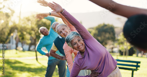Class, stretching and workout with old people in park for wellness, fitness or mobility exercise. Joint friendly training, retirement and learning with senior men and women outdoor for warm up