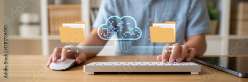 Digital cloud data transfer with folders and person typing cloud computing data storage