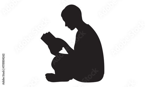 Child reading a book silhouette