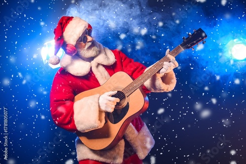 Cool Santa Claus with guita...