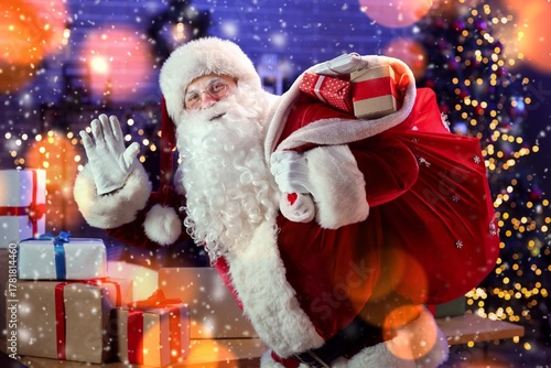 Santa Claus with bag full o...