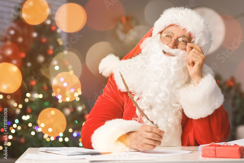 Santa Claus making list of ...