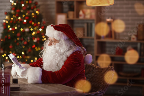 Santa Claus with letters at...