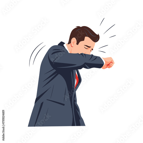 Businessman sneezing into elbow while wearing a suit indoors  