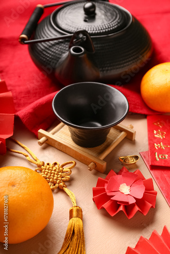 Cup with teapot, mandarins ...