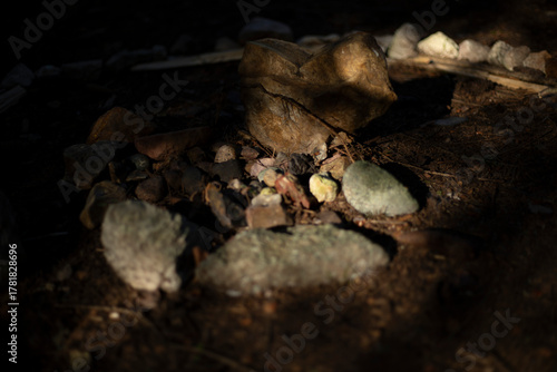 Rocks in the forest. Beautiful stones are collected in one place. Minerals excavated from the ground.