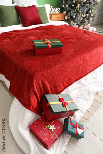 Big bed with Christmas pres...