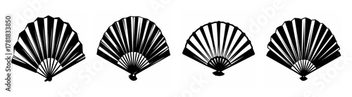 Four black and white graphic art paper folding fans displayed side by side in a row