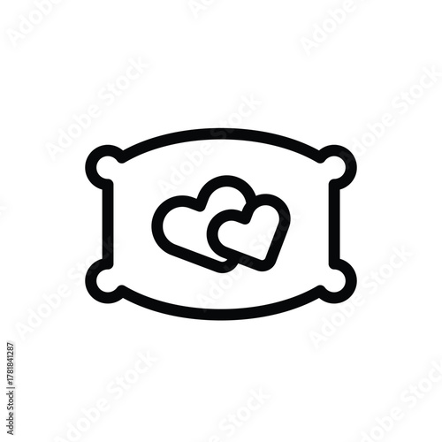 A pillow with two hearts on it