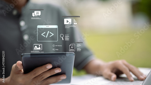 Person using tablet with AI programming and machine learning technology concept