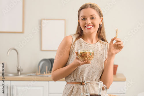Young woman with tasty okro...