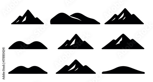 Silhouette set of nine mountain icons on dark background