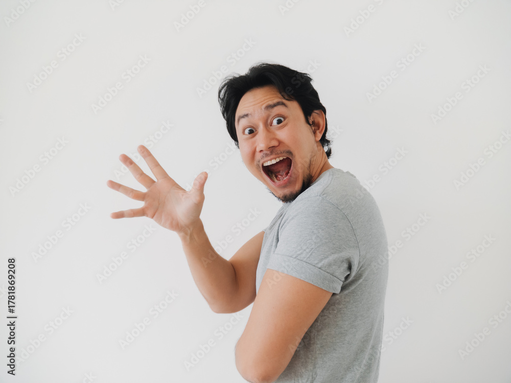 Fototapeta premium A Joyful Man Energetically Waving in a Bright and Inviting Environment Filled with Cheer