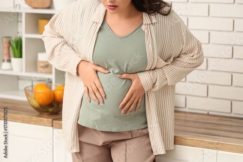 Young pregnant woman suffer...