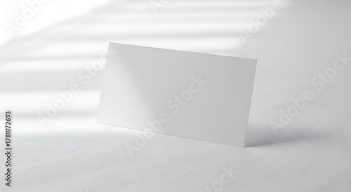 Minimalist White Blank Business Card Mockup on Textured Surface