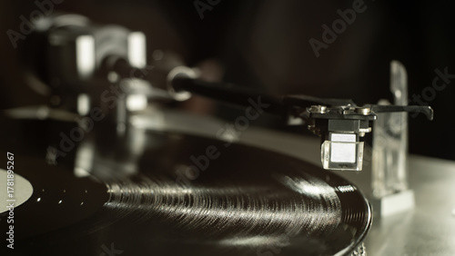 Photos Vinyl record spinning on turntable player