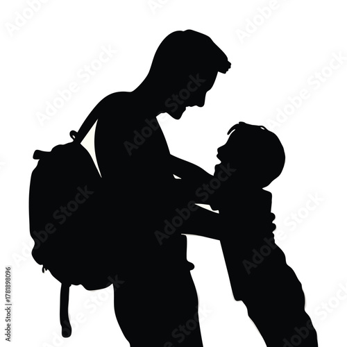 Father’s day silhouette of a father meeting his son after returning from work