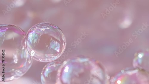 Wallpaper Mural Iridescent soap bubbles floating in a soft pink background with rainbow reflections. Torontodigital.ca