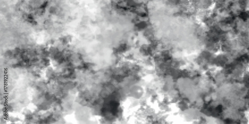 Abstract smoky grayscale texture with swirling clouds of light and dark ink, creating a misty, atmospheric background with soft gradients and dynamic contrast.