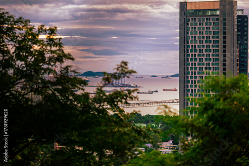 Background of a classic car steering wheel, a nine-series car with a manual transmission, a rural passenger transport vehicle in Thailand.