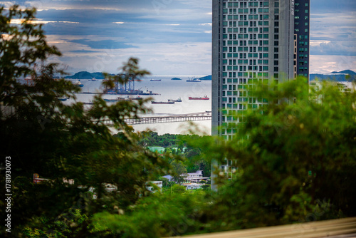 Background of a classic car steering wheel, a nine-series car with a manual transmission, a rural passenger transport vehicle in Thailand.