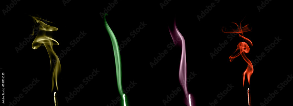 Fototapeta premium Colorful smoke waves in yellow, green, purple, and red on black background, showing soft motion and abstract energy art concept. Ideal for design, meditation, or creative backgrounds.