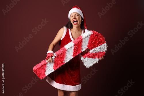Happy young woman in dress ...