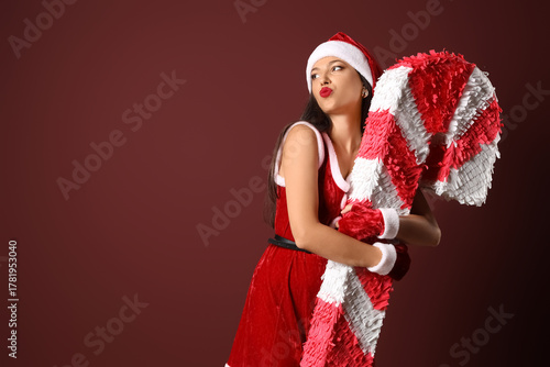 Pretty young woman in dress...