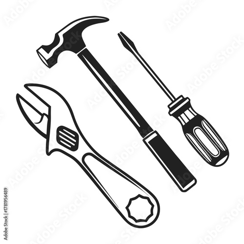 Set of three common hand tools including a hammer wrench and screwdriver