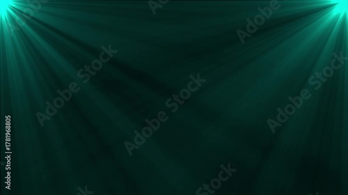 Underwater light rays teal green deep ocean sunbeams shimmering aquatic background abstract motion