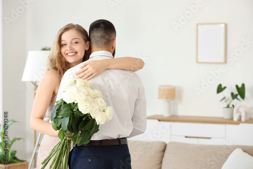 Engaged young couple with w...