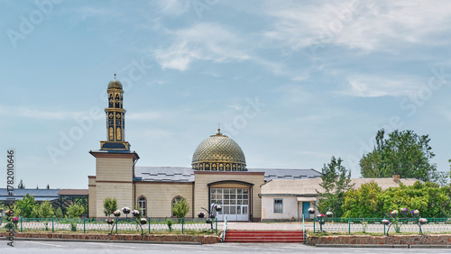 Modern mosque with golden dome and minaret in Cholpon-Ata, Kyrgyzstan