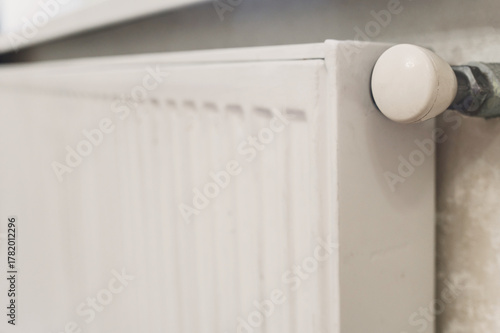 Wallpaper Mural A heating battery with a regulator for controlling the temperature in the house during the cold season. Savings on utilities and heating. Reasonable consumption of heat and gas. Torontodigital.ca