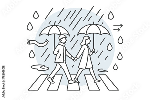 Couple walking across crosswalk in heavy rain holding umbrellas